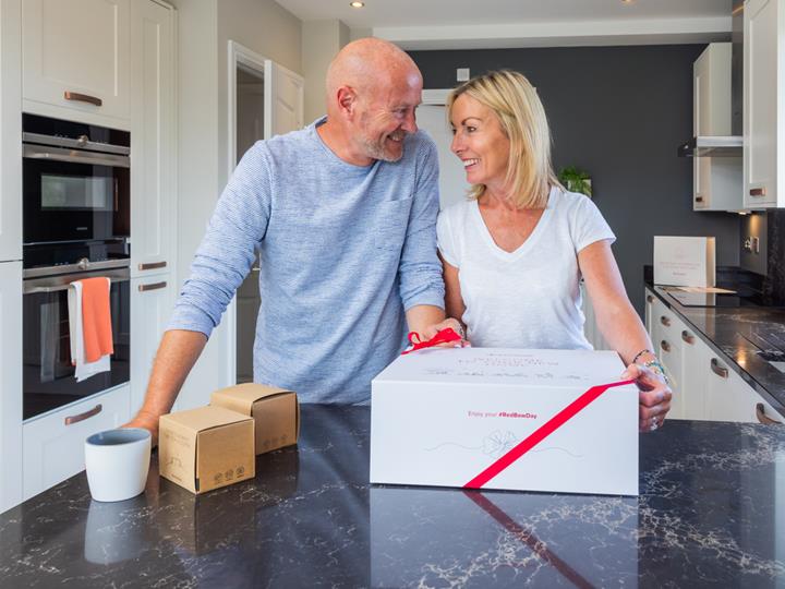 About Redrow - Award-Winning - Satified couple in new home