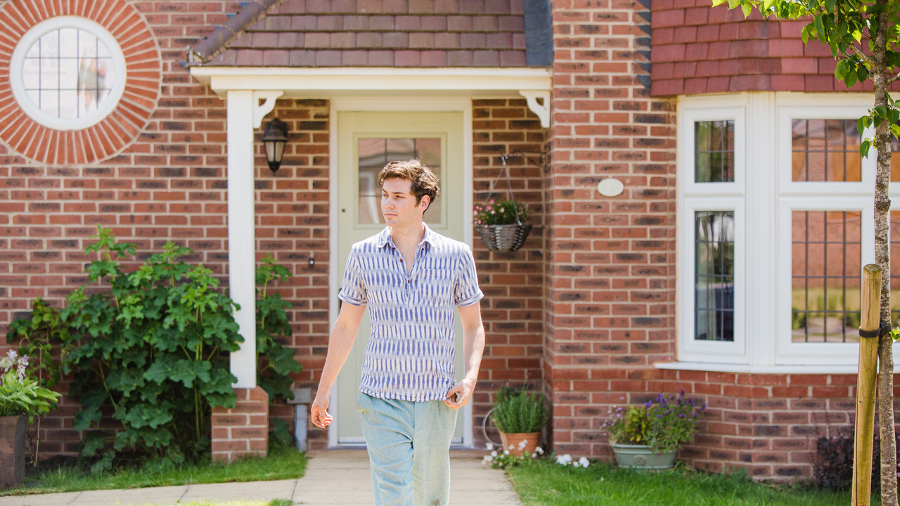 Redrow - Inspiration - A man leaving his heritage home