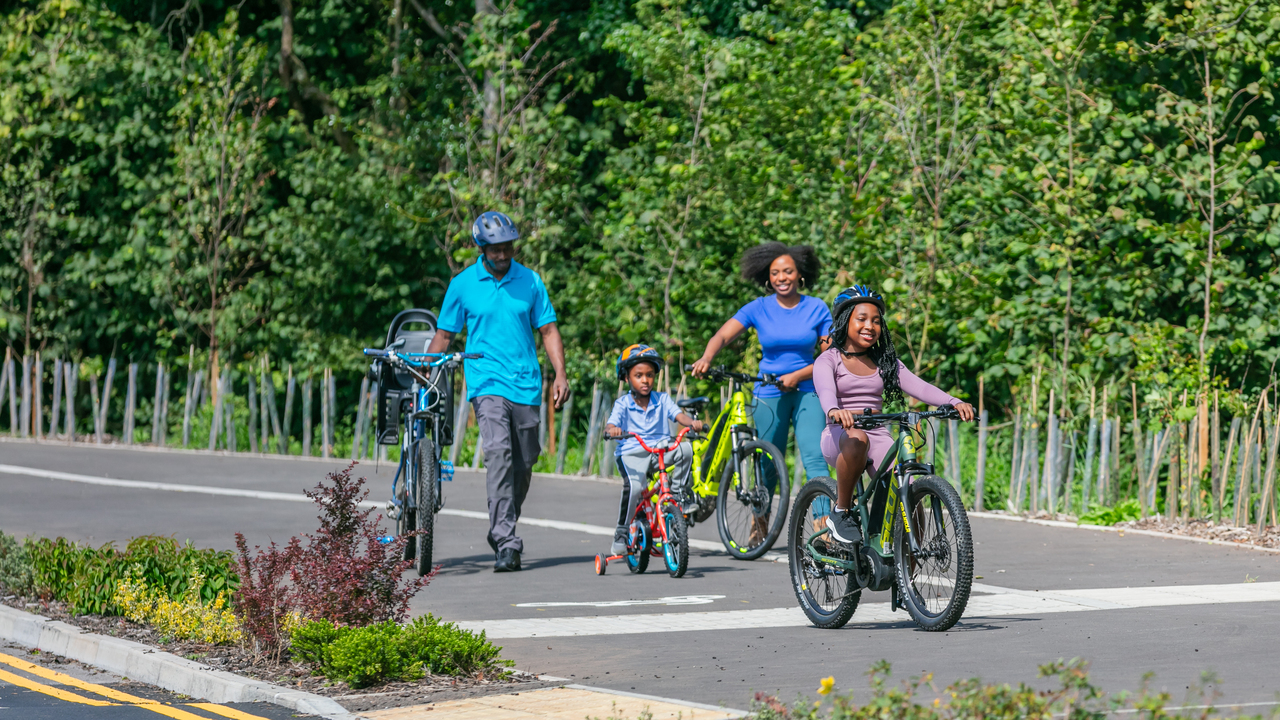 Redrow - Inspiration - Family riding bikes