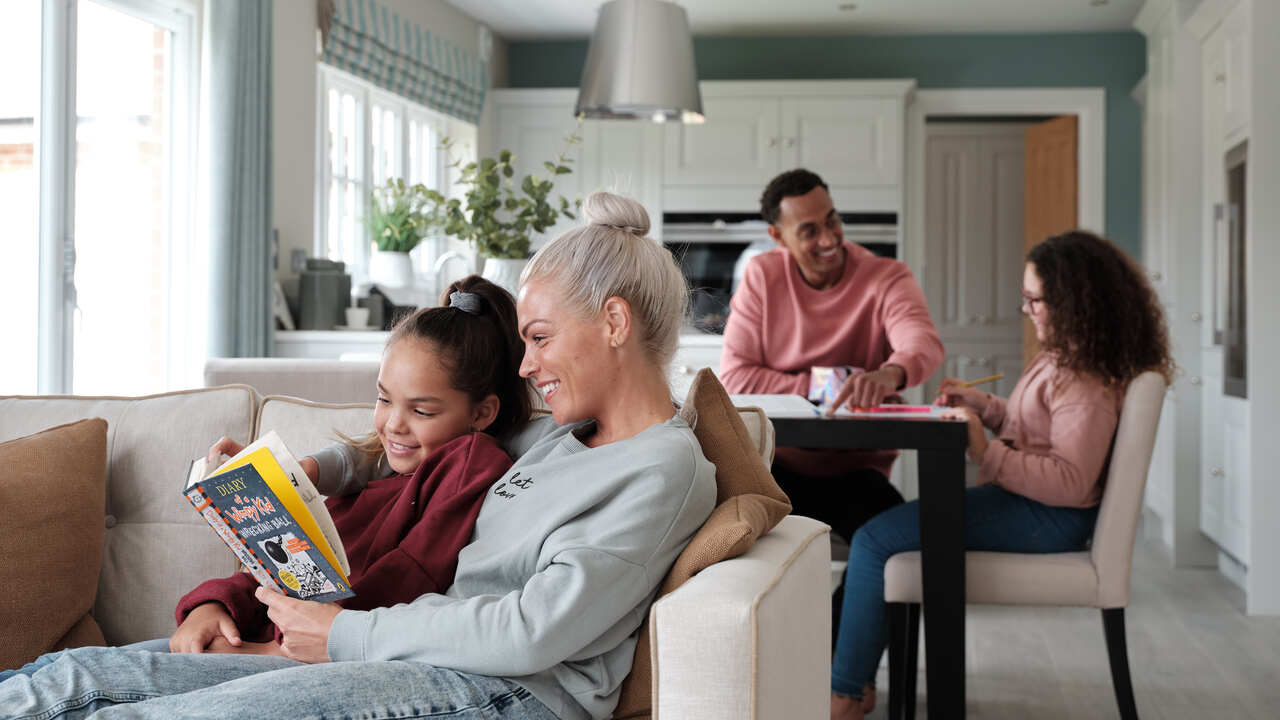 Redrow | Inspiration | A mother holding her daughters hand by the patio door