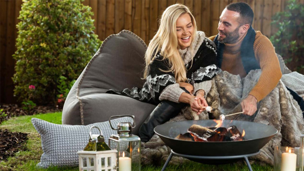 Redrow | Inspiration | Happy couple using a Sun Trap