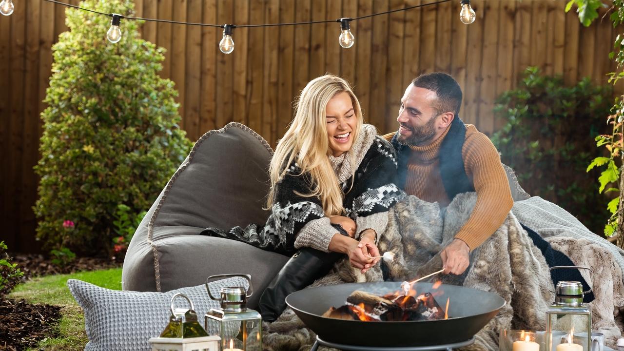 Redrow - Inspiration - couple by firepit