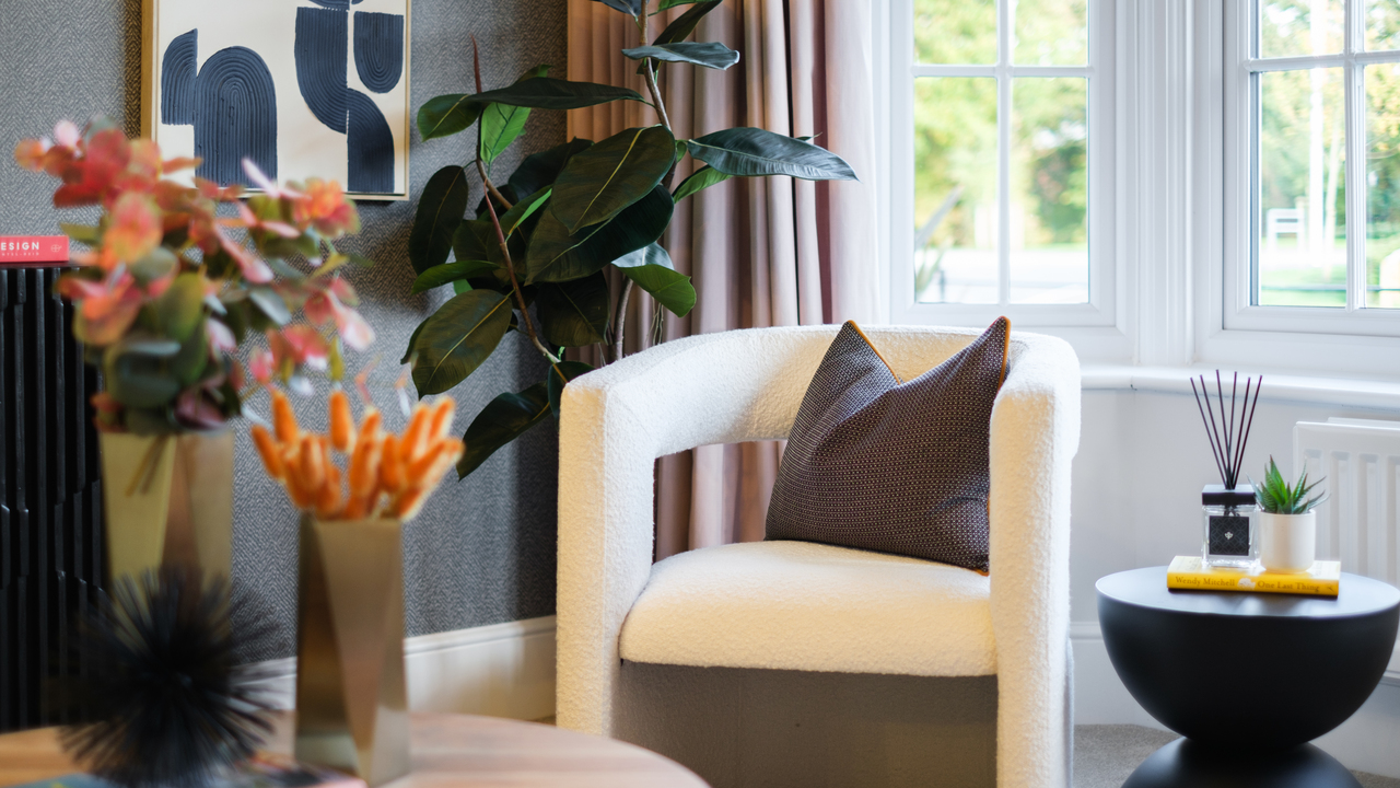 Redrow - Inspiration - Lounge with chair infront of window and plants