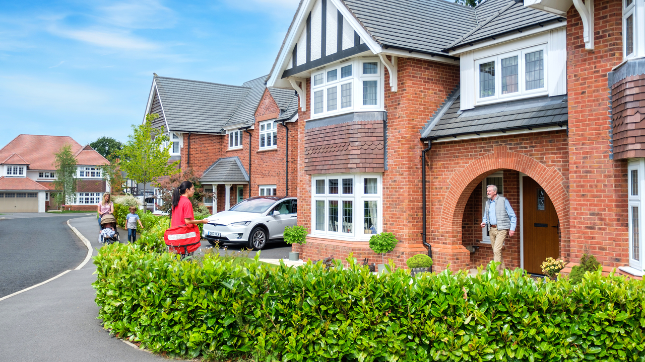 Redrow - Inspiration - Man greeting postman at Bleinham home