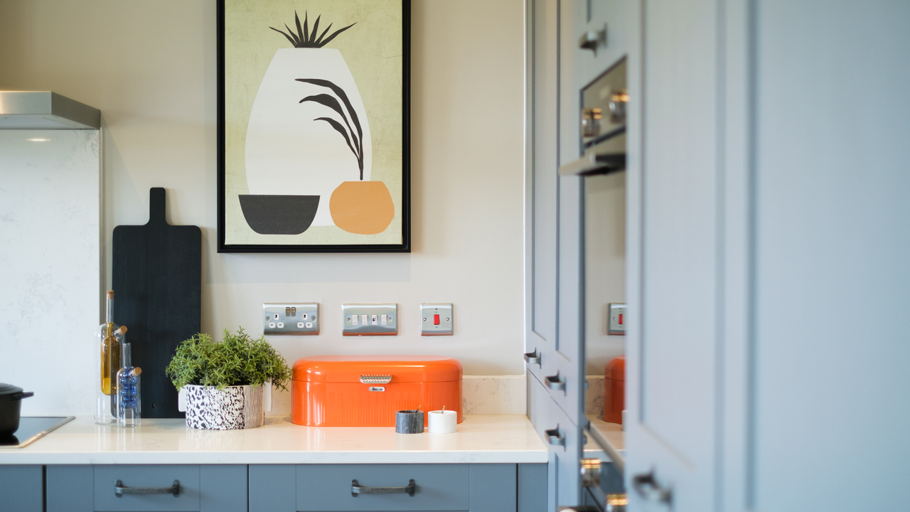 Redrow - Inspiration - kitchen with orange accessories