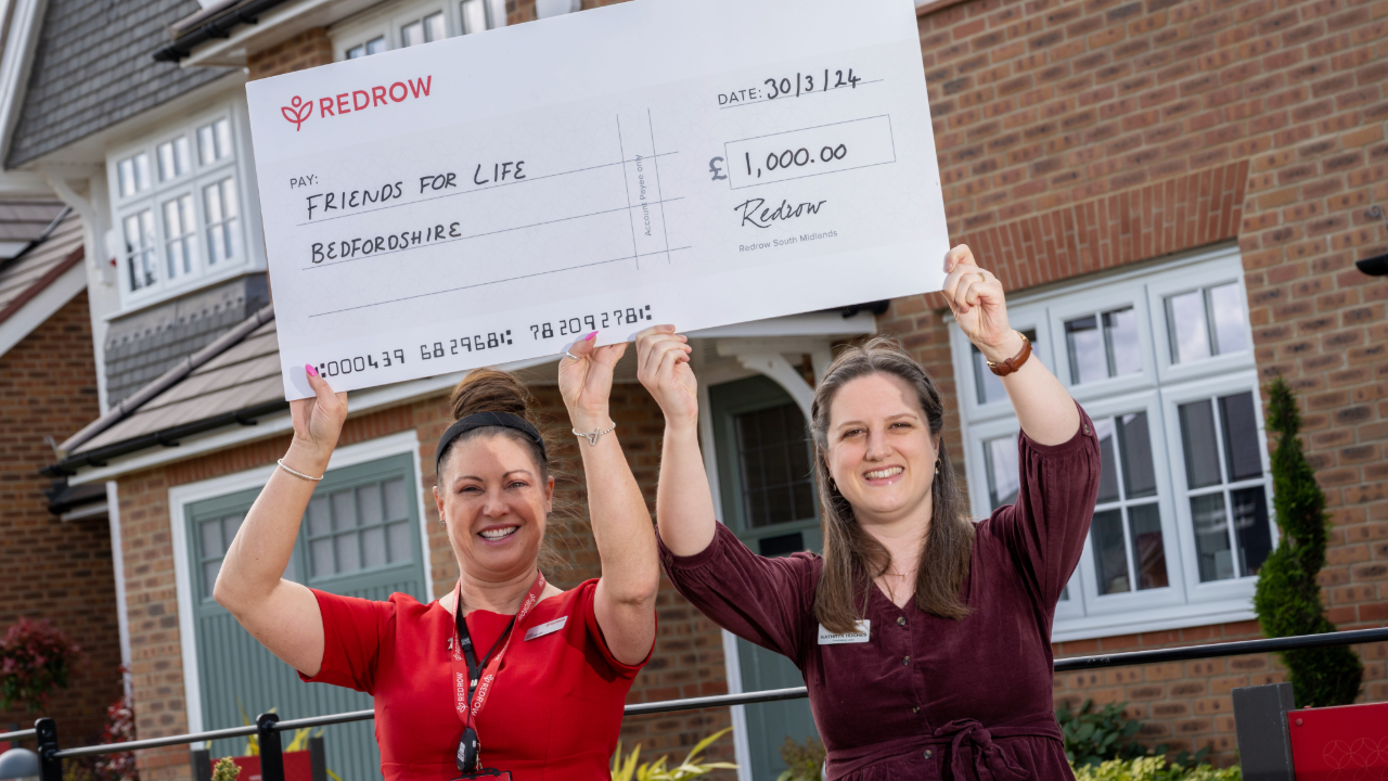 A representative image of Redrow donating to local Bedford charity