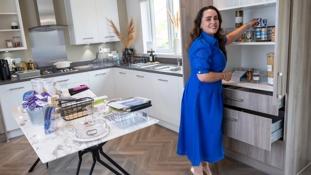 Redrow - News - Elizabeth decluttering the kitchen
