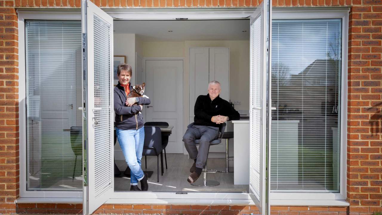 Redrow - News - Nic Ian and Hugo with patio doors open
