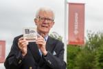 Redrow - News - Churchwarden celebrating the funding from Redrow