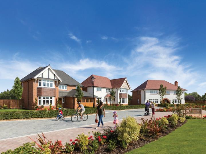 People exchanging contracts during the house buying process